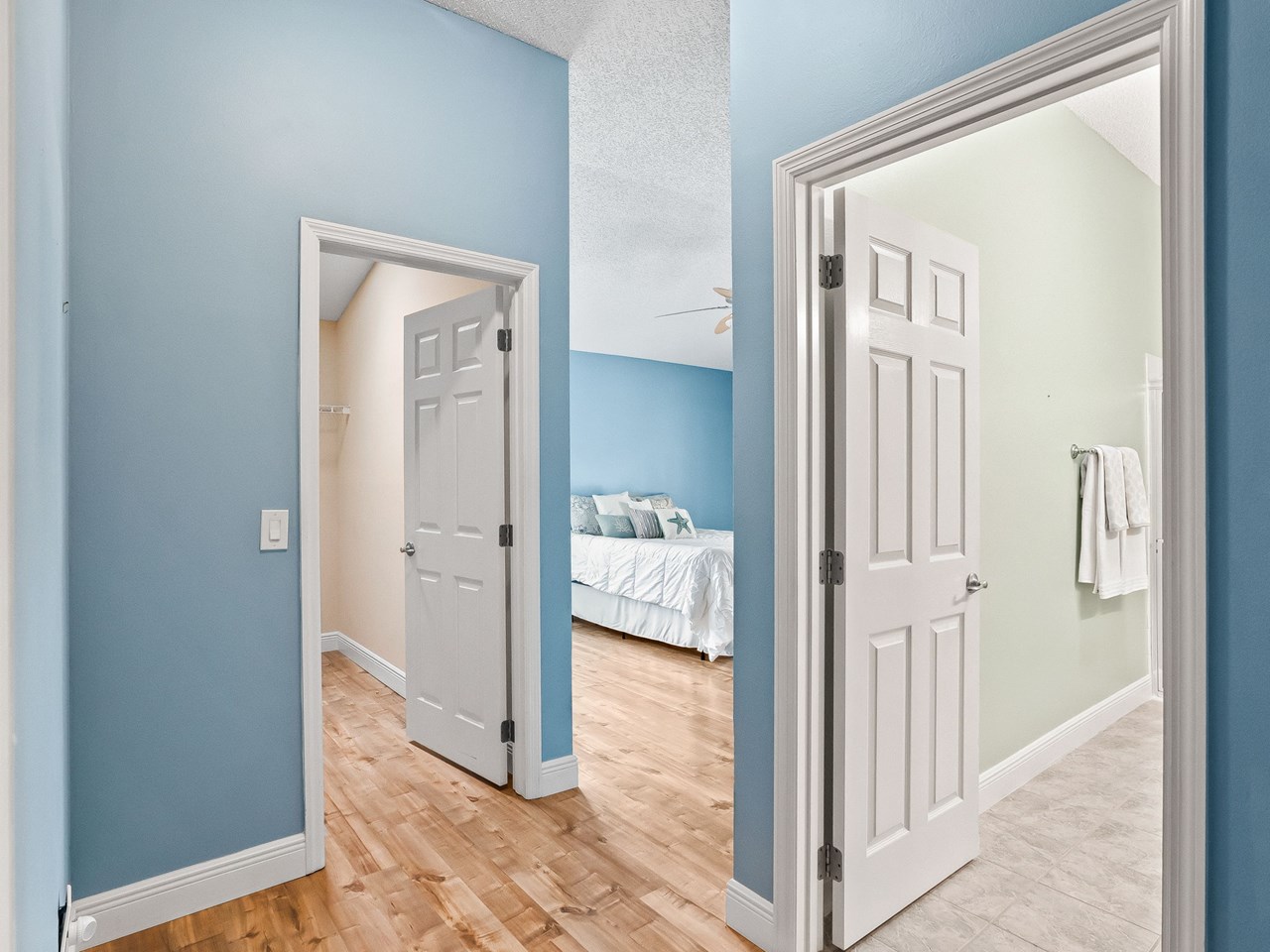 primary suite the large primary bedroom includes a spacious walk-in closet and en suite bathroom.
