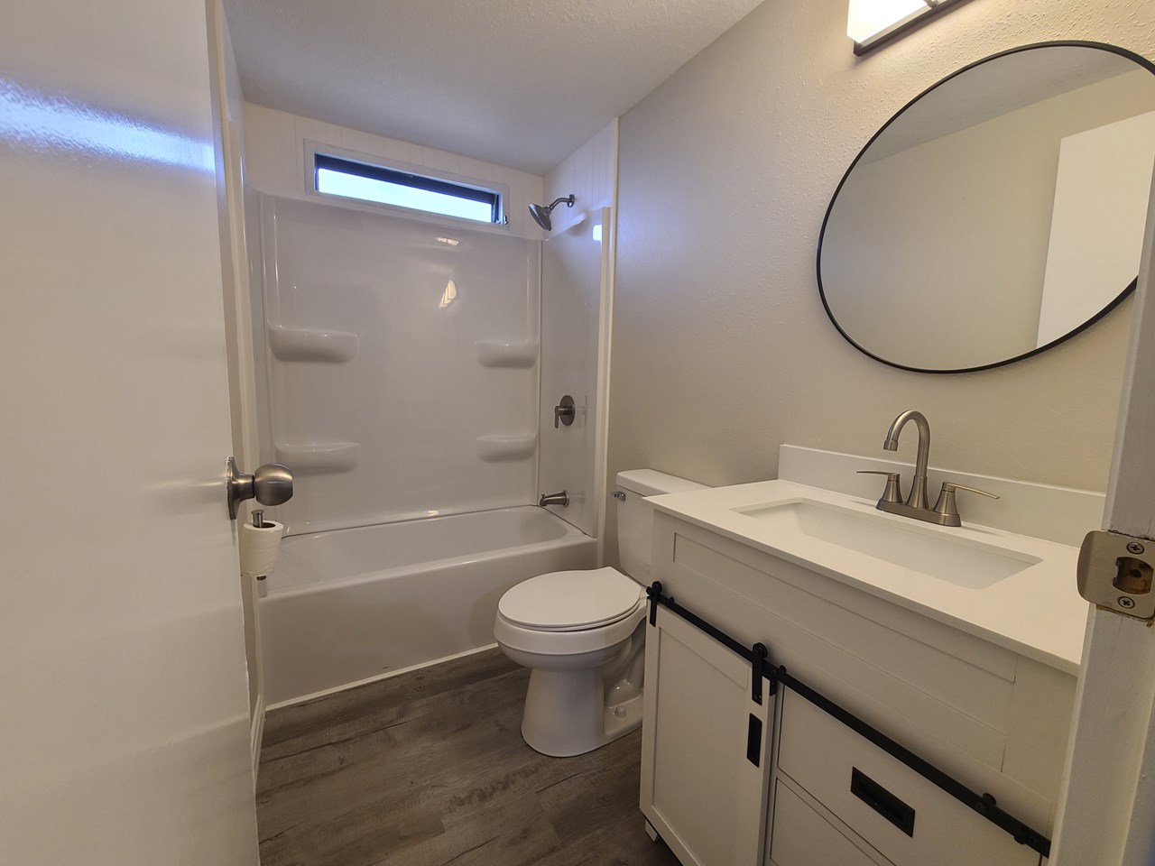 guest bath all new tub, surround and vanity